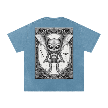 Blue t-shirt with a graphic design of a skeleton with bat wings on the back