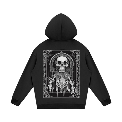 Black hoodie with a skeleton design on the back against a white background