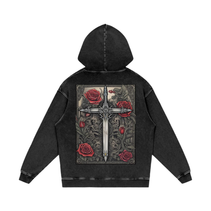 Black hoodie with a decorative design on the back featuring roses and a sword on a white background