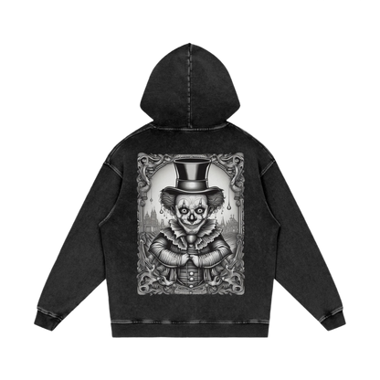 Black hoodie with a detailed clown design on the back against a white background