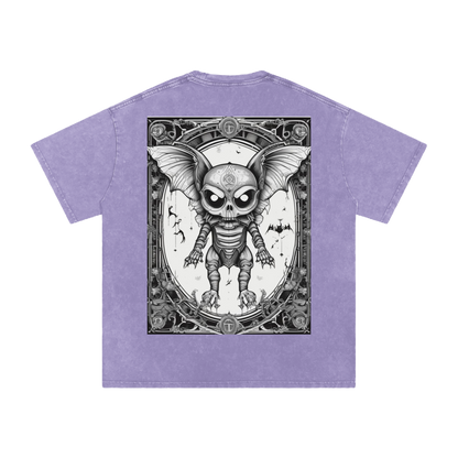 Purple t-shirt with a graphic of a skeleton bat in an ornate frame on a white background